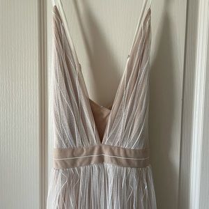 Luxxel formal, floor length dress. White and nude colors, spaghetti straps.